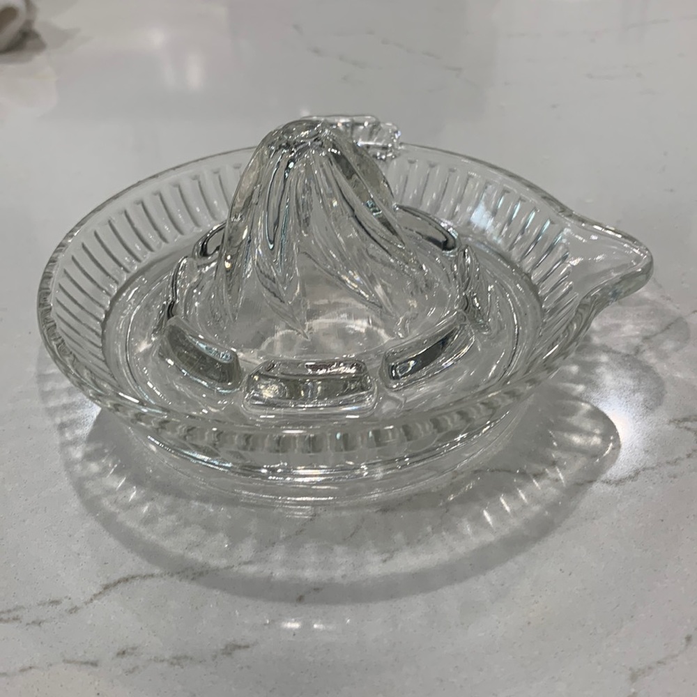 Small glass citrus juicer